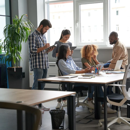 Product and design teams collaborating in a workshop